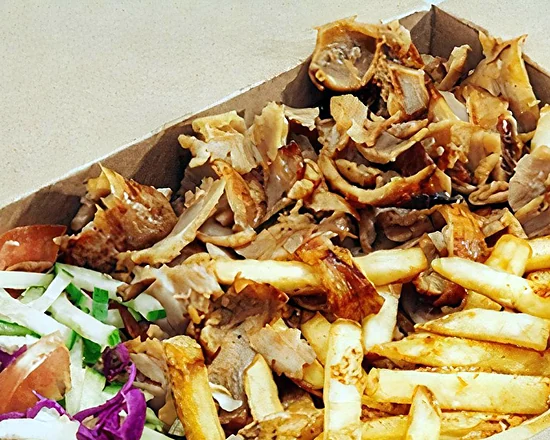 Chicken Shawarma Box with fries, shredded cabbage, lettuce and tomato in a kraft box